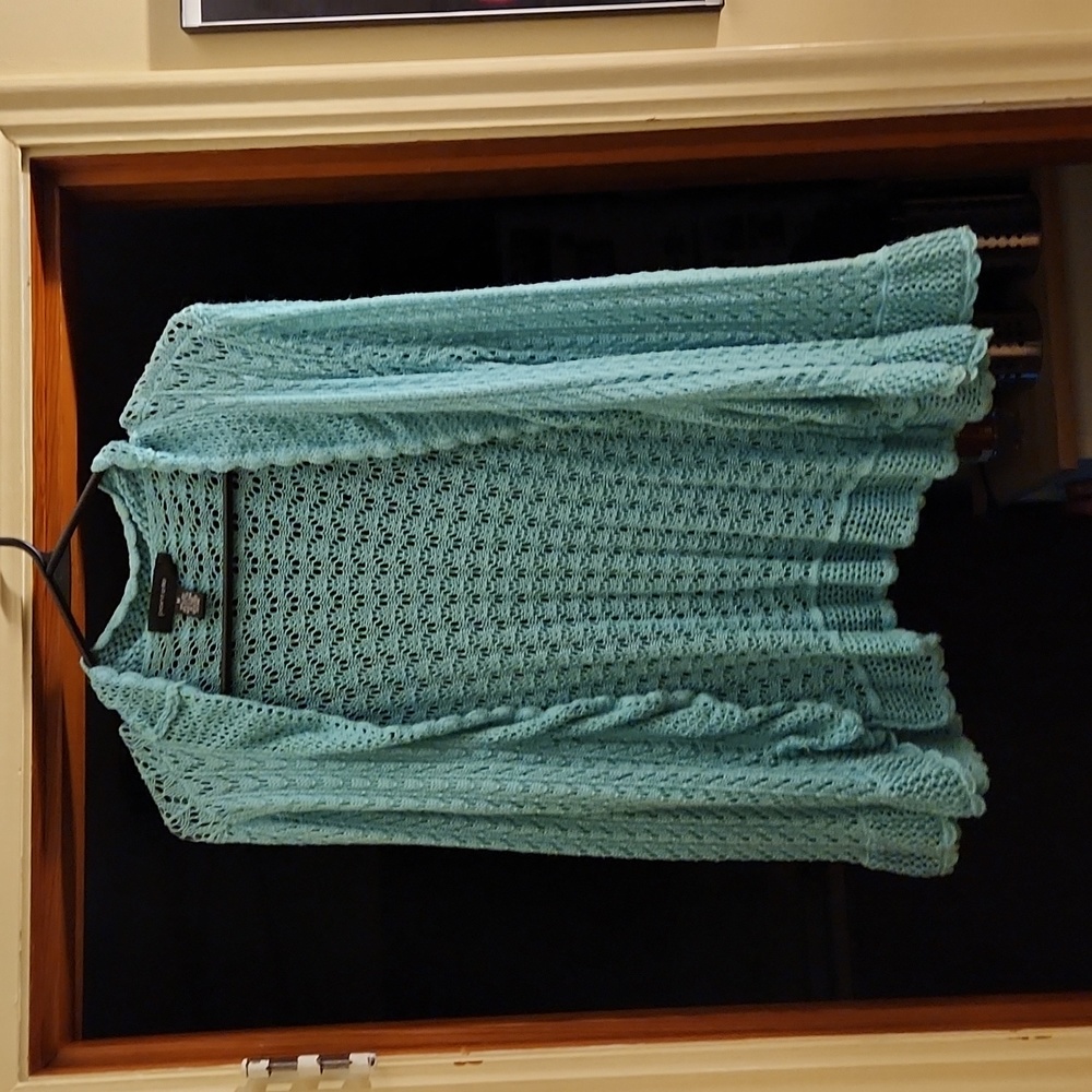 Pointelle size Medium, crocheted mid-arm sweater.
